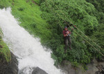 Waterfall rappelling flying Fox